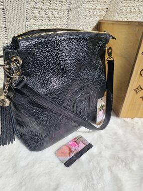 Black Leather Shoulder Bag with Tassel Accent